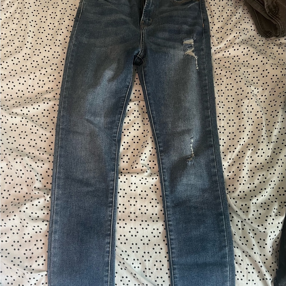 Distressed Blue Denim Jeans